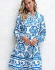 Lichtblauwe Mini - jurk met Tribale Print, Knoopjes en V - hals - Bella Fit™