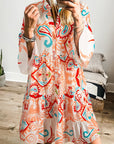 Mini - jurk met tribalprint, armbandmouwen en knoopsluiting - Bella Fit™