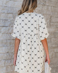 Witte losvallende mini - jurk met strikjesprint en halflange pofmouwen - Bella Fit™