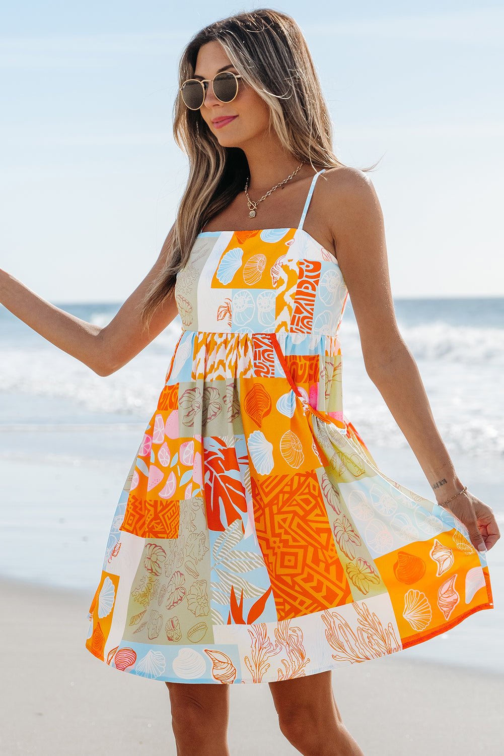 Oranje Zomerdress met Schelpenprint, Patchwork en Zwierige Striksluiting - Bella Fit™